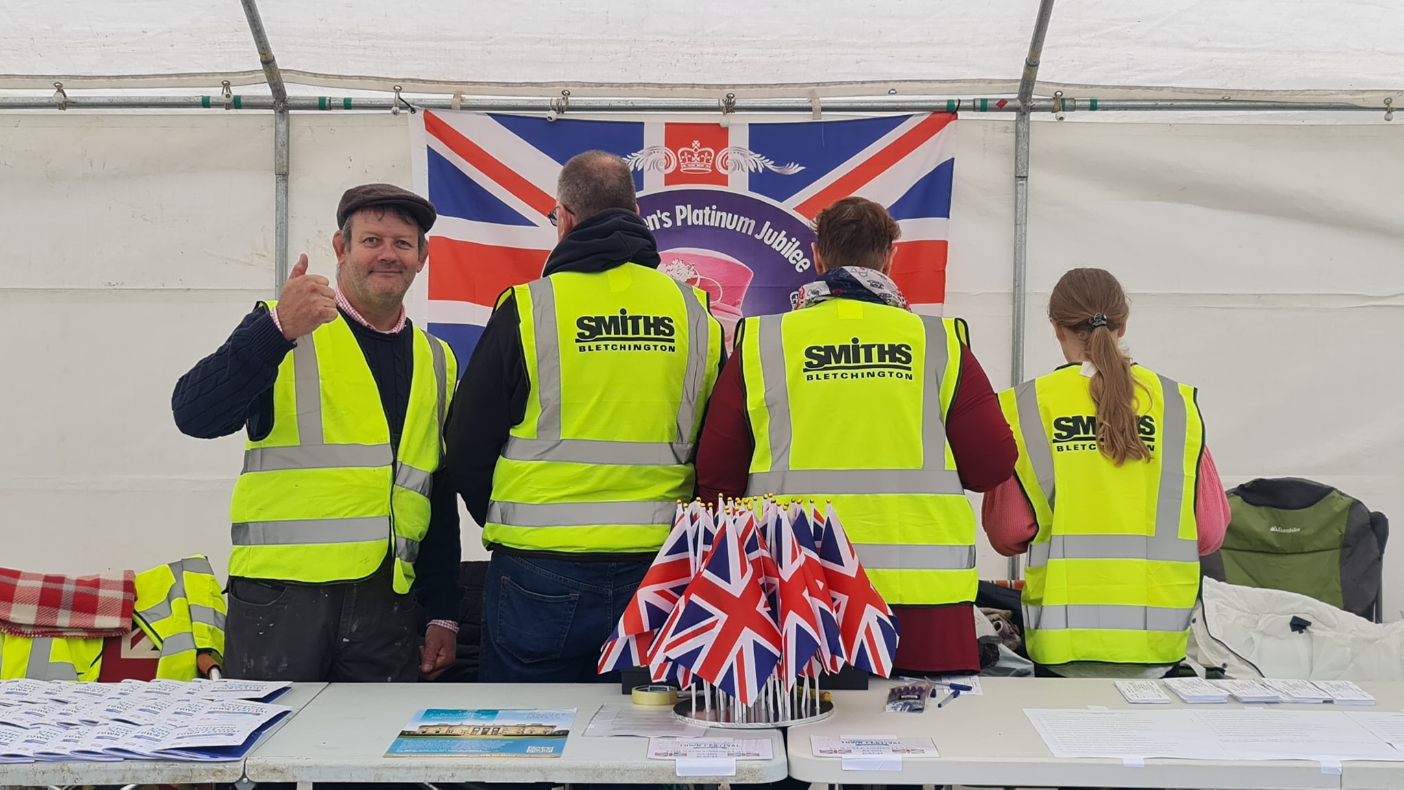 Volunteers of Chipping Norton Festival Wearing Hi Vis Jackets